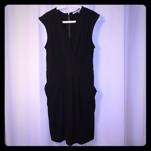 Collective concepts black dress with pocket detail